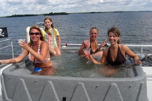 people in lake hot tub
